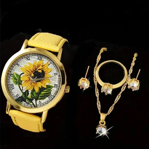 A set of a women's watch, a chain, a necklace, a ring, and earrings, gold-colore